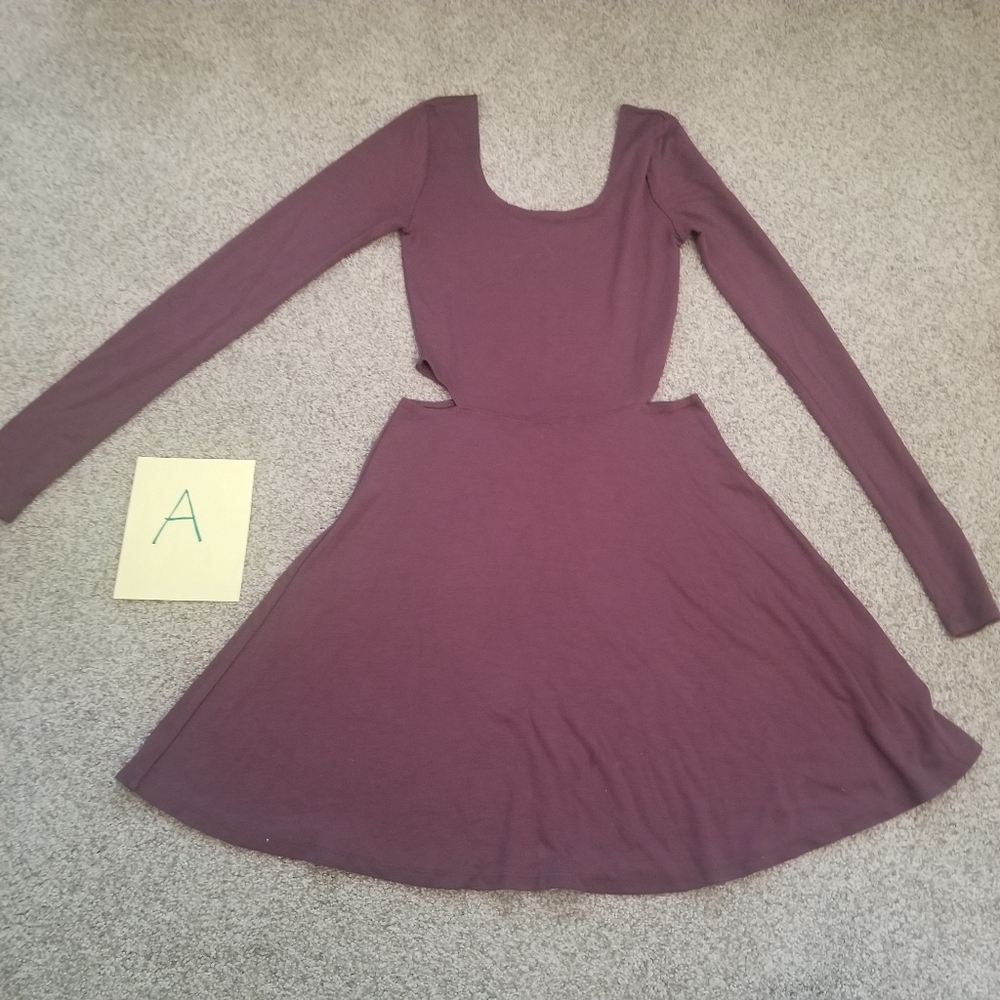 Garage XS petite stretchy a- line dress with triangle cut outside on the waist.